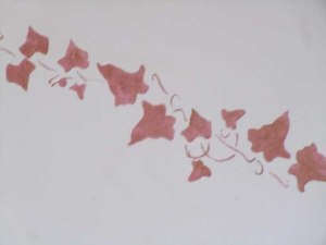 Leaves on the wall in my room, up close.