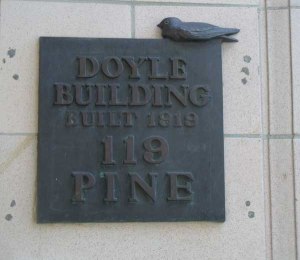 Metal sign on the Doyle Building