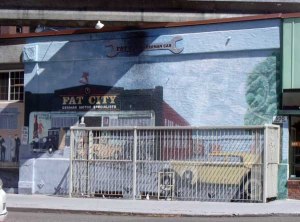 Fat City mural on car repair shop